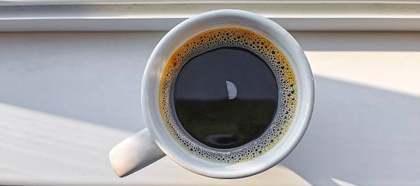 istock Enjoy cup of coffee on the windowsill by the pool. 2230249336