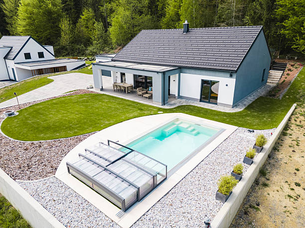 istock Modern House with Pool and Landscaped Garden 2230256338