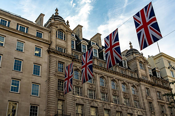 istock Patriotic British flags hanging over a building in central London 2230275682