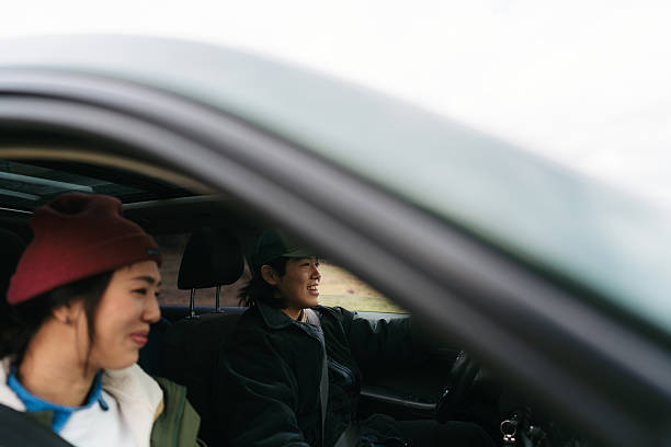 istock Asian couple on a road trip 2230276985