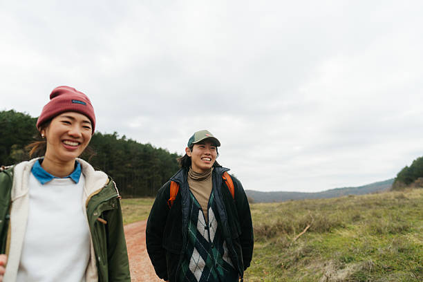 istock Asian couple on a hiking adventure 2230277014