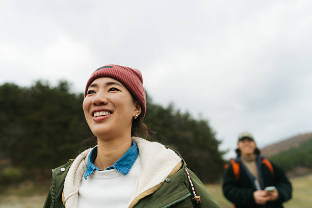 istock Asian couple on a hiking adventure 2230277034