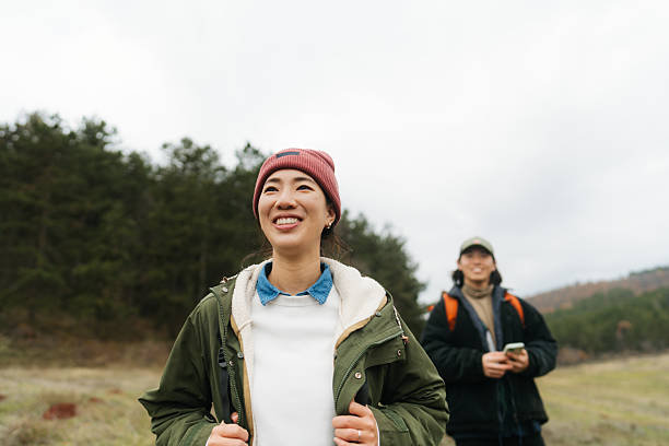 istock Asian couple on a hiking adventure 2230277049