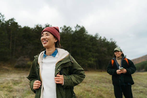 istock Asian couple on a hiking adventure 2230277055