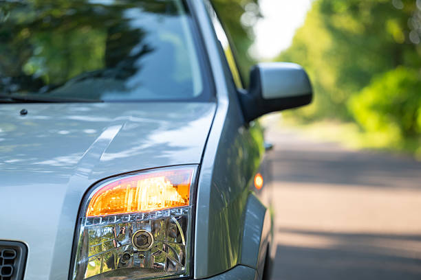 istock Close-up of a gray car emergency lights blinking 2230277079