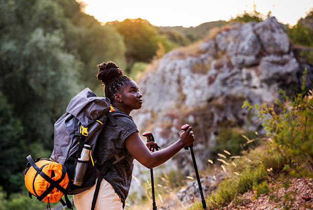 istock Sole Female Hiker Exploring Remote Mountain Trail 2230281686