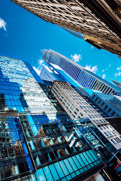 istock Modern High-Rise Buildings Against Bright Blue Skyscrapered New York Sky 2230281754