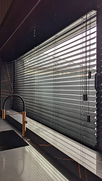 istock Black Wooden Horizontal Blinds in Modern Kitchen 2230285908