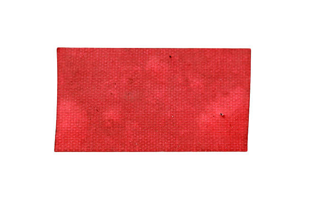istock Old condition red sticker isolated on white background with clipping path. 2230286564
