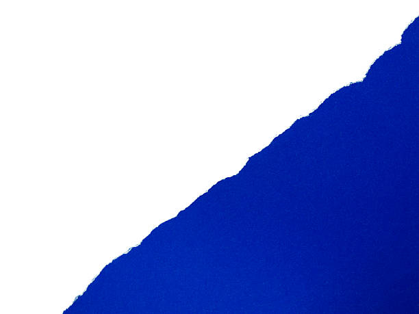 istock Pieces of torn or cut blue paper, design elements isolated on white background with clipping path. 2230287135