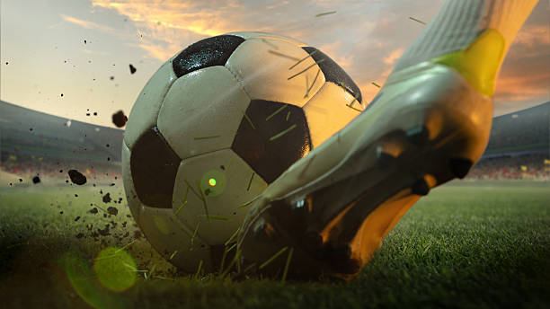 istock Soccer player kicking ball on 3D grass stadium field at sunset 2230288887