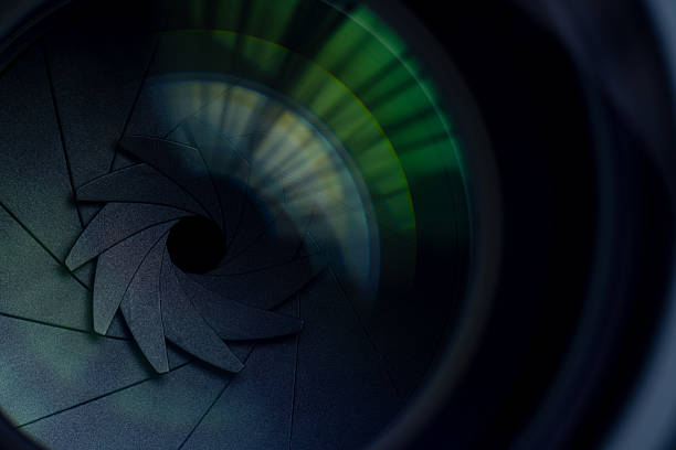 istock Close-up macro camera lens,Photo Camera or Video lens close-up on black background, objective, concept of photographer camera man job, looking for a photographer, journalist, a videographer to work black and white 2230291220