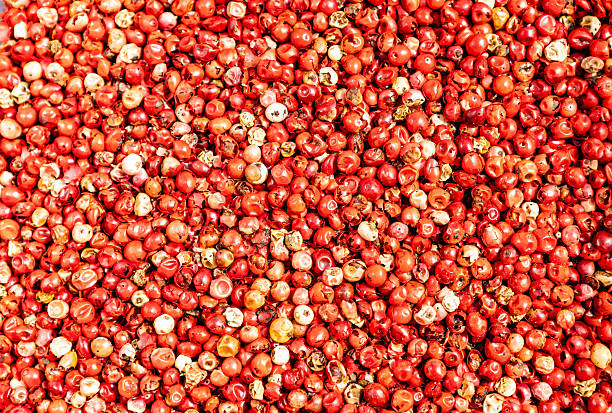 istock Bright red peppercorns scattered across a textured surface for culinary use in cooking or spice blends during a vibrant food preparation session 2230294004