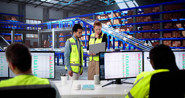 istock Diverse Team Working On Automated Warehouse Management 2230296266