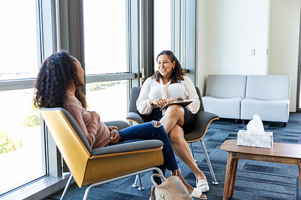 istock Two Women in Casual Clothing Having a Discussion During Therapy 2230299833