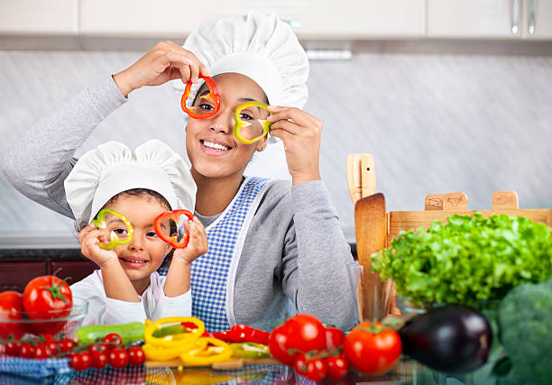 istock Happy family in the kitchen. 2230299987