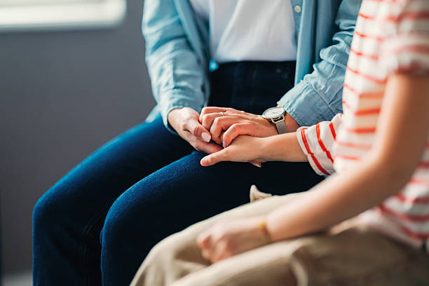 istock Close-Up of Hands Holding Showcasing Empathy and Compassion in Supportive Environment 2230313886