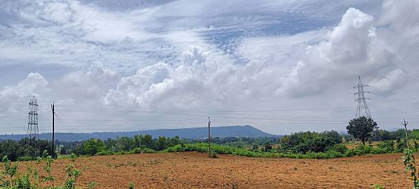 istock landscape view of mountain and field under sky 2230314904
