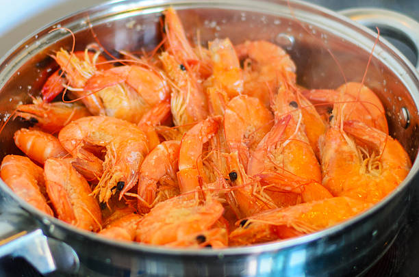 Fresh prawns in a kitchen sink for cleaning in preparation for cooking