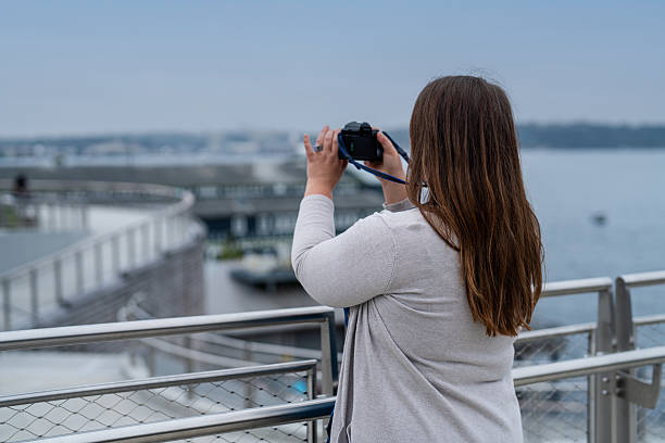 istock Millennial Tourist Photographing View 2230319364