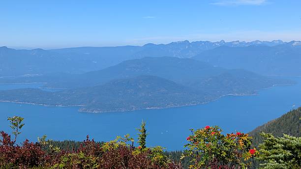 istock Vast blue sky over scenic pacific northwest mountain and inlet landscape (Howe Sound on British Columbia's coast) 2230323108