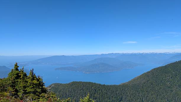 istock Vast blue sky over scenic pacific northwest mountain and inlet landscape (Howe Sound on British Columbia's coast) 2230323182