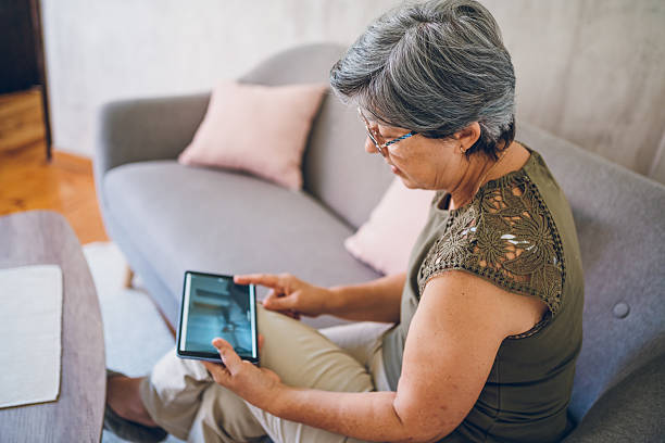 istock A woman using tablet and searching for apartments online 2230326848