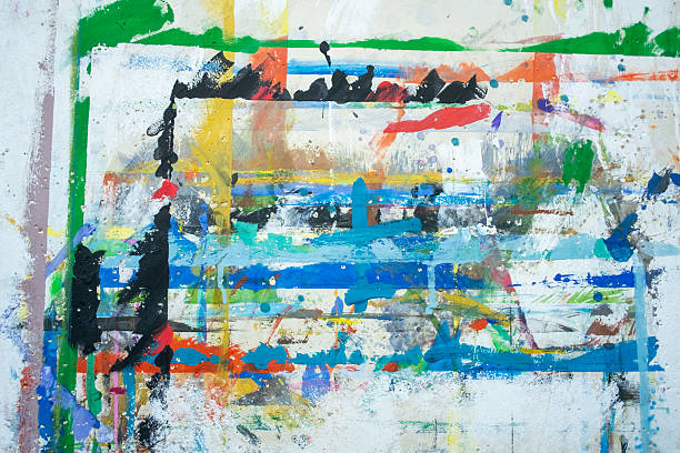 istock Colorful paint palette and brush on blue background 2230331551