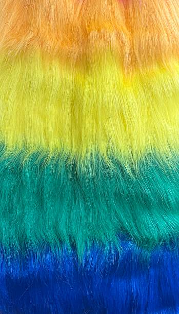 istock Colored fake fur fabric, orange, yellow green blue 2230332202