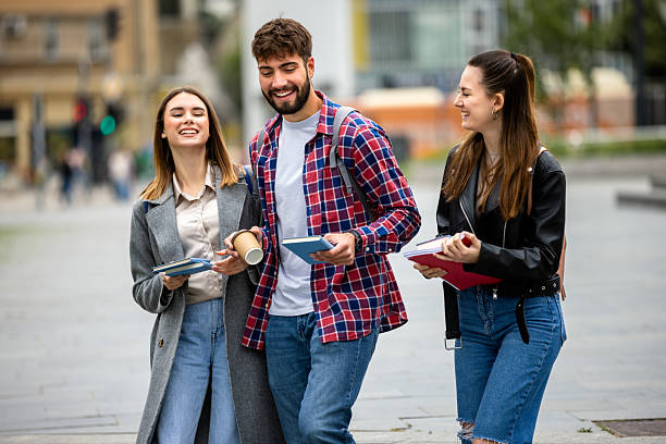 istock Group of Students Laughing on College Campus 2230332380
