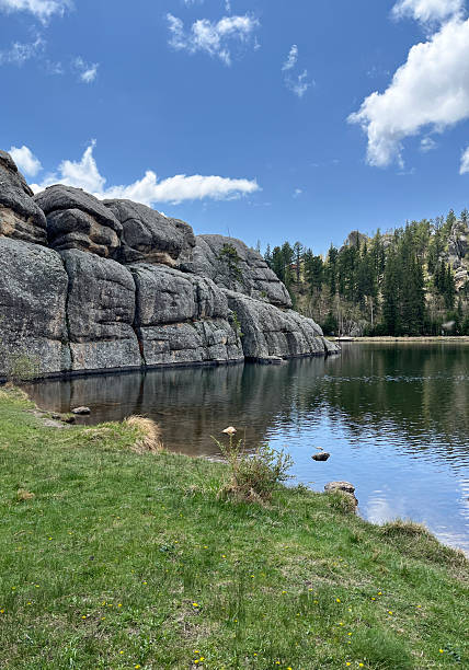 istock Sylvan lake in Custer State Park with blue skies 2230333688