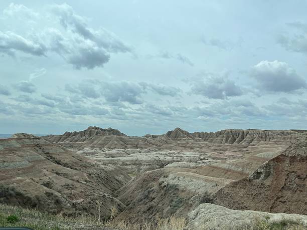 istock South Dakota badlands park overlook with rugged mountains 2230333736
