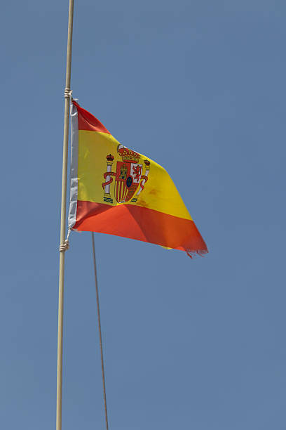 Spanish flag waving in the wind on a sunny day
