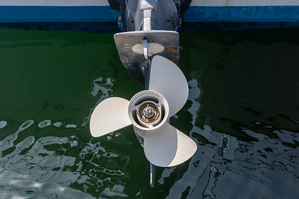 istock Boat propeller submerged in green water, ready for sailing 2230340210