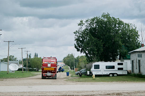 istock Garbage Truck and Trailer Homes in Saskatchewan Small Town 2230342014