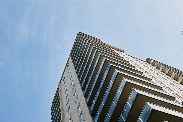 istock Brick Apartment Building with Trees in Saskatchewan 2230342253
