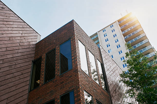The worldwide headquarters of Amazon, or Amazon.com, located in downtown Seattle Washington, feature dual towers with multiple architectural features.  Dividers provide for a colorful, abstract visual display.