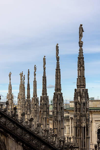 istock Beautiful architectural details with statues on the top of building of the Milan Cathedral (Duomo di Milano), the cathedral church of Milan, Lombardy, Italy. Dedicated to the Nativity of St Mary 2230347364