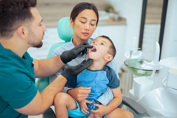 istock Asian family having a dental checkup. 2230347854