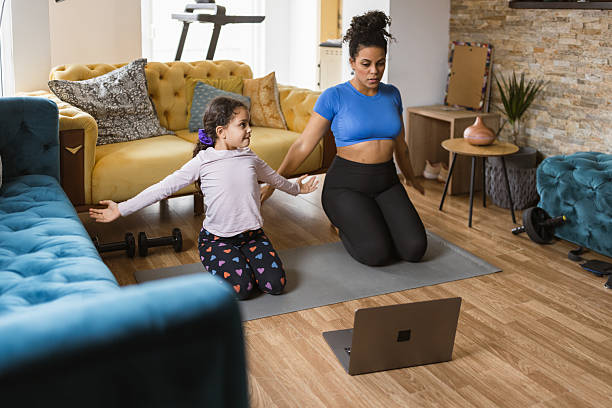 istock Home Workout with Mother and Daughter 2230347898