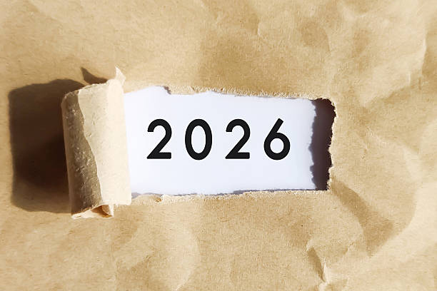 istock Year 2026 revealed under torn brown paper 2230352355