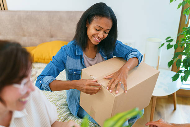 istock Diverse Female Friends Moving Into a New Home 2230376000