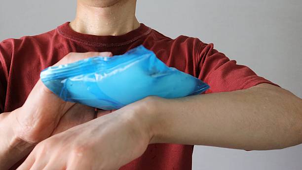 istock A person cooling their body with ice packs 2230376143