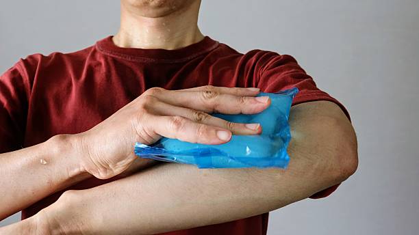 istock A person cooling their body with ice packs 2230376160