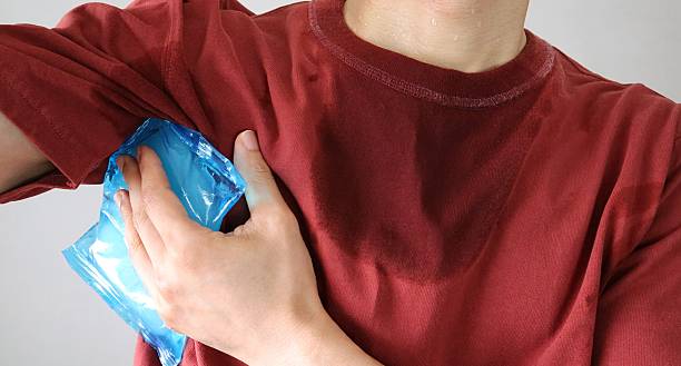 istock A person cooling their body with ice packs 2230376170