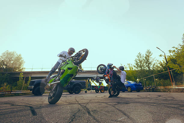 istock Moto stunt riding show on street. 2230377577