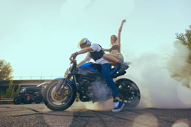istock Moto stunt riding show on street. 2230377596