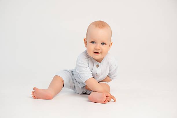 istock baby boy on a white isolated background, space and room for text 2230385174