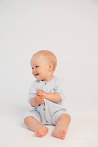 istock baby boy on a white isolated background, space and room for text 2230385177