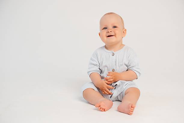 istock baby boy on a white isolated background, space and room for text 2230385187